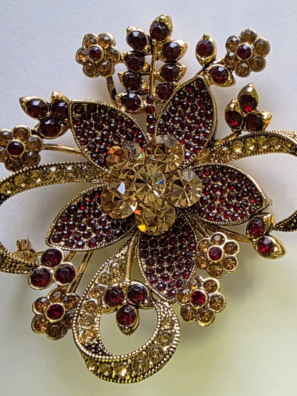 Large Vintage Avon Gold-Tone Floral Brooch with Red and Amber Crystals